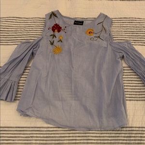 Stripes blouse with floral embellishments